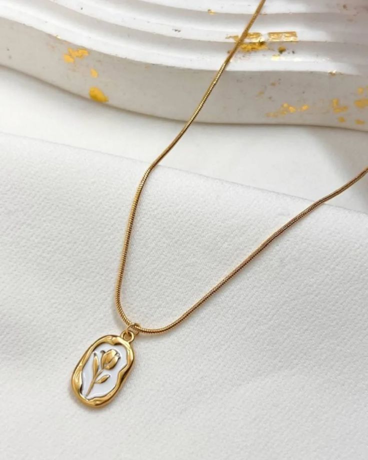 Golden flower love symbol pendant