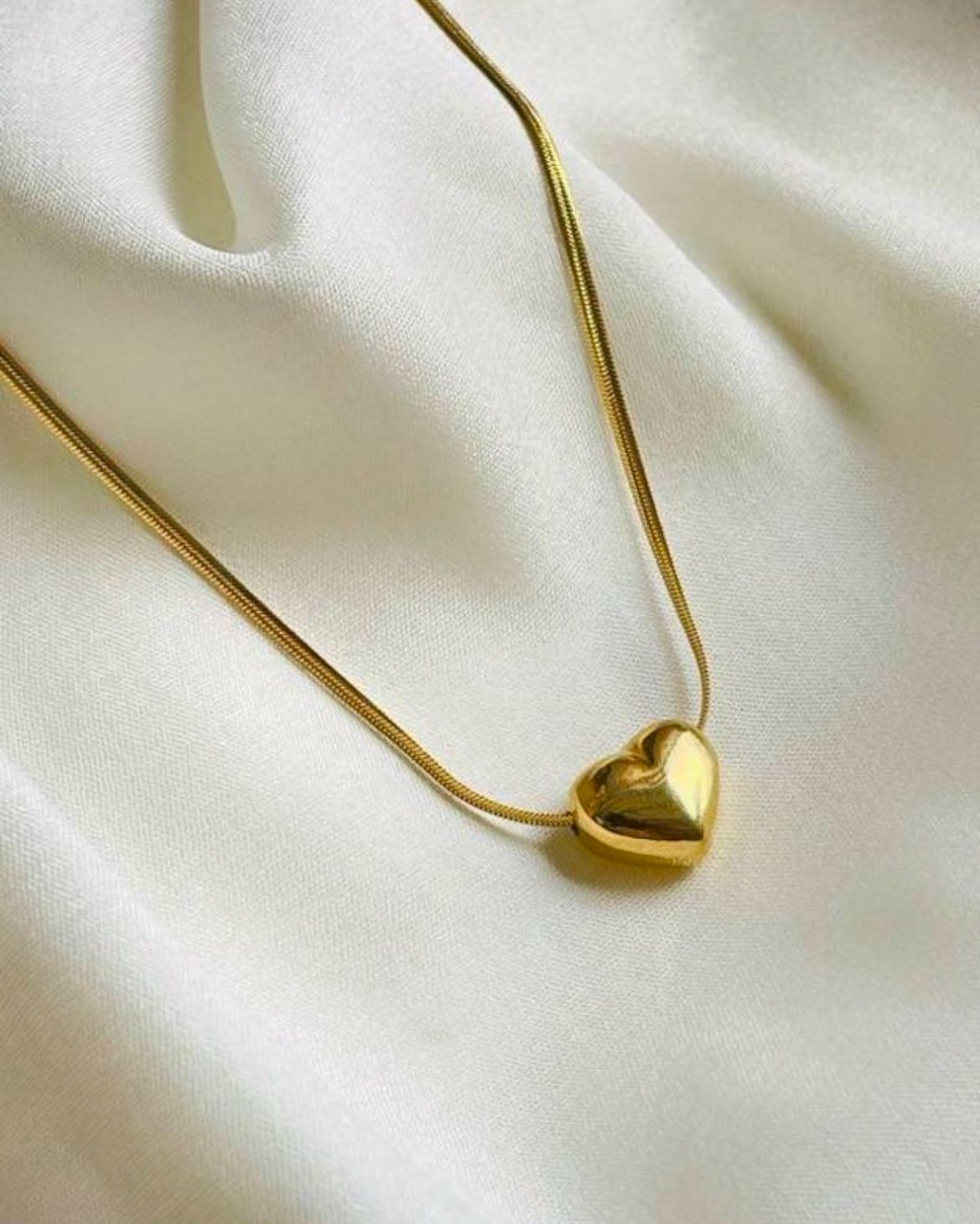 Golden heart pendant