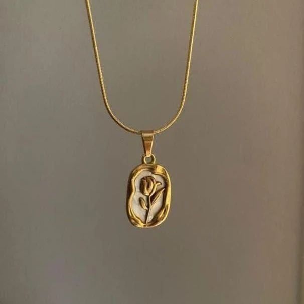 Golden flower love symbol pendant