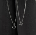 Hello kitty x batman matching pendent