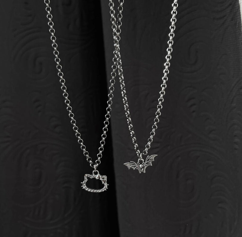 Hello kitty x batman matching pendent